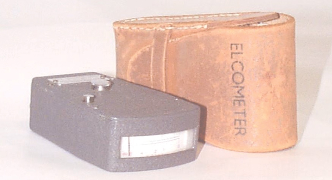 The original Elcometer coating thickness gauge with its stamped leather carry case