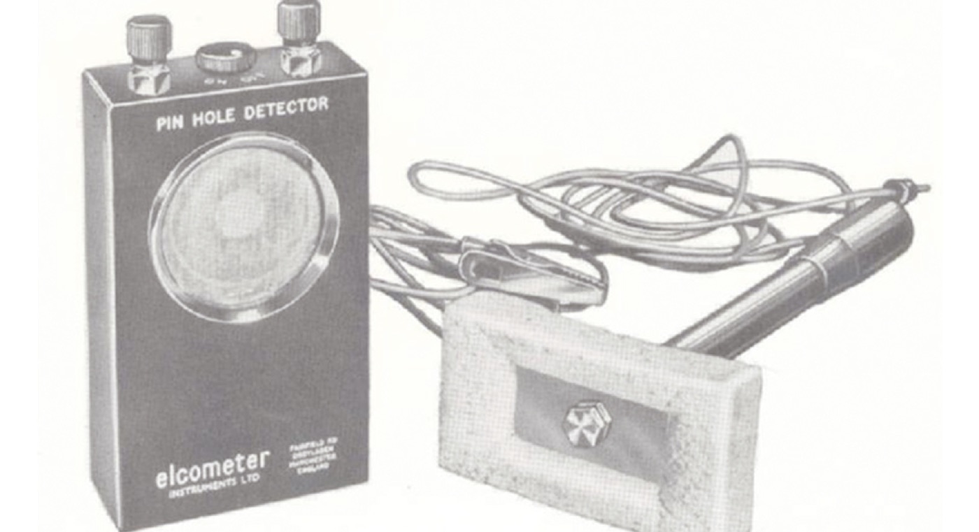 An Elcometer pinhole detector with its wet sponge probe and leads