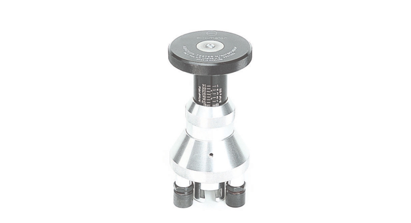 An Elcometer pull-off adhesion tester