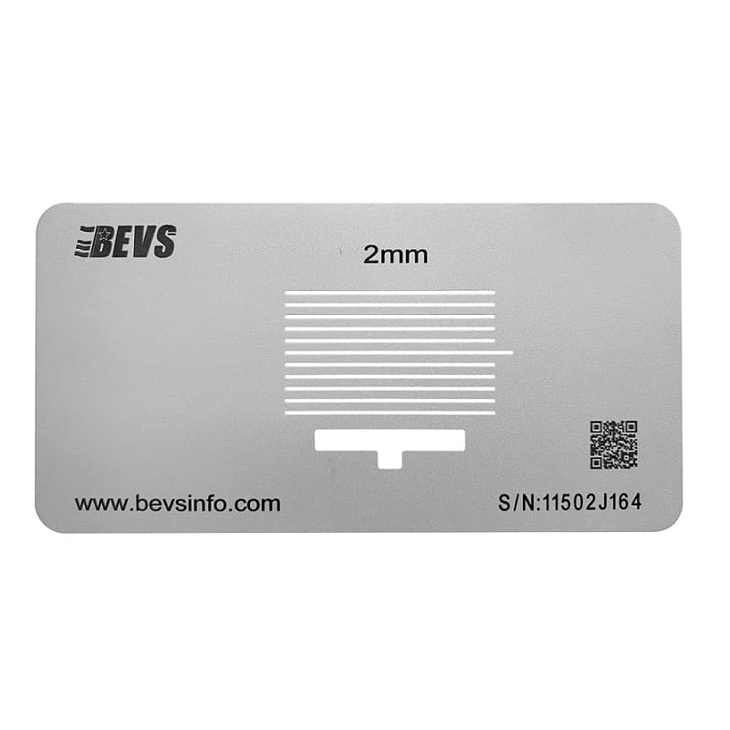 BEVS 2213 Hatch Gauge, a flat stainless steel plate marked 2mm with a row of cutting slots above a T-shaped window